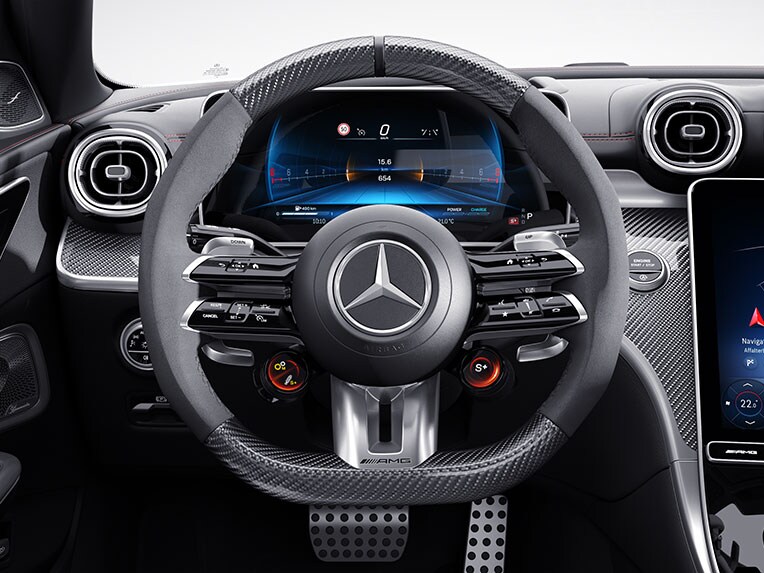 El volante AMG Performance en diseño de fibra de carbono/microfibra MICROCUT de Clase C Sedán de Mercedes-AMG.